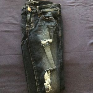 AE dark wash skinny jean with rips